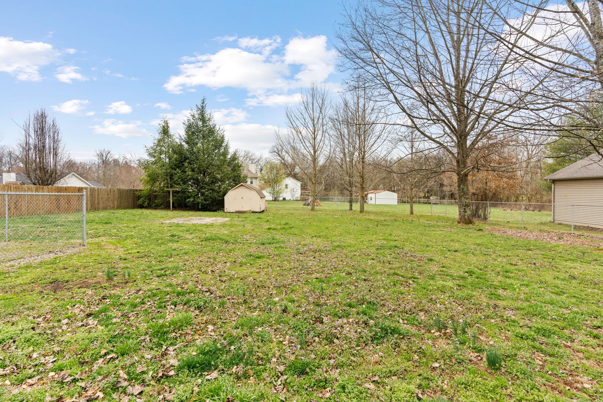 108 Meadows Road White House, TN 37188 - Photo 24 of 27 a view of a field with an trees