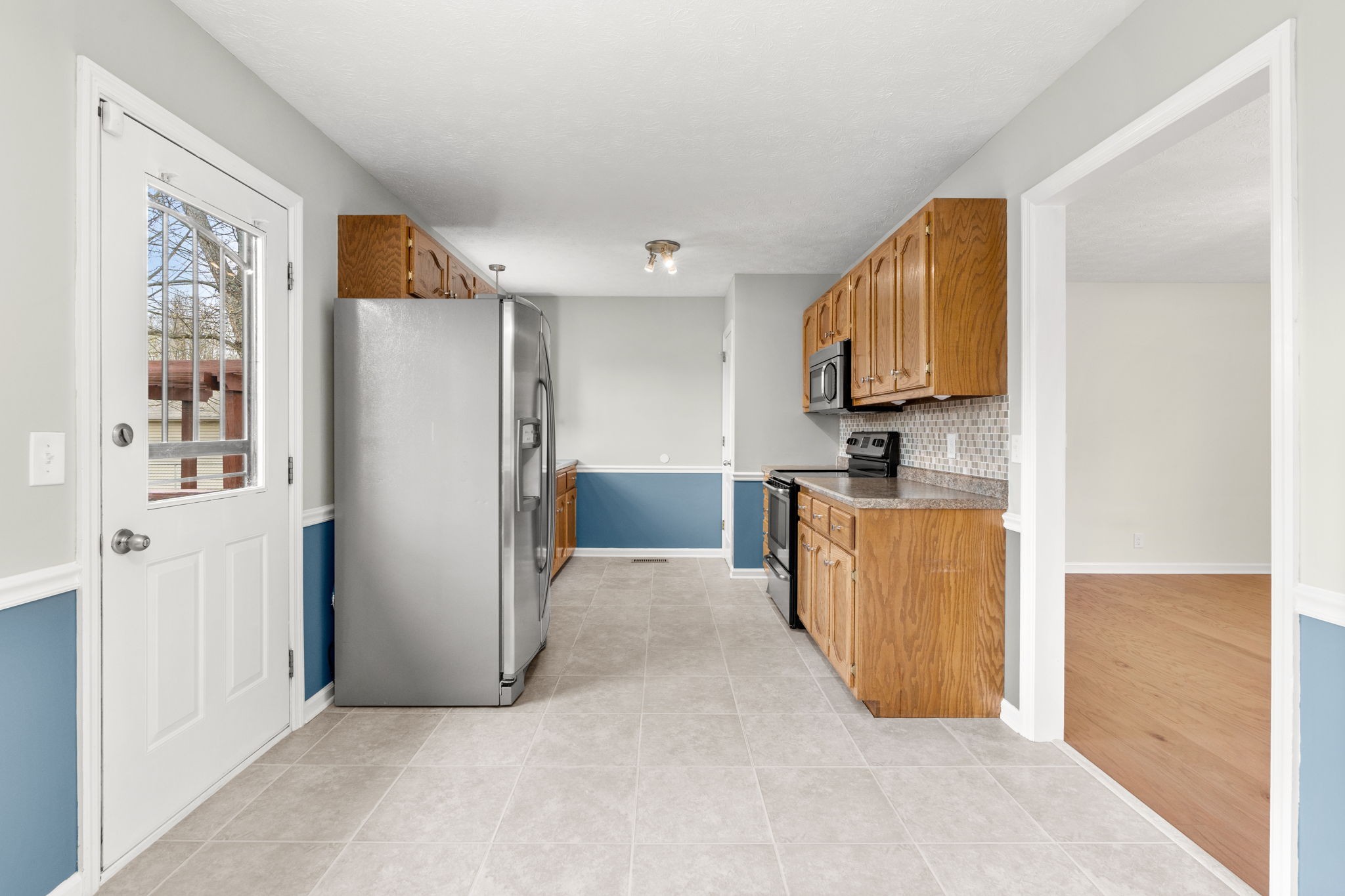 108 Meadows Road White House, TN 37188 - Photo 9 of 27 a view of kitchen with stainless steel appliances cabinets