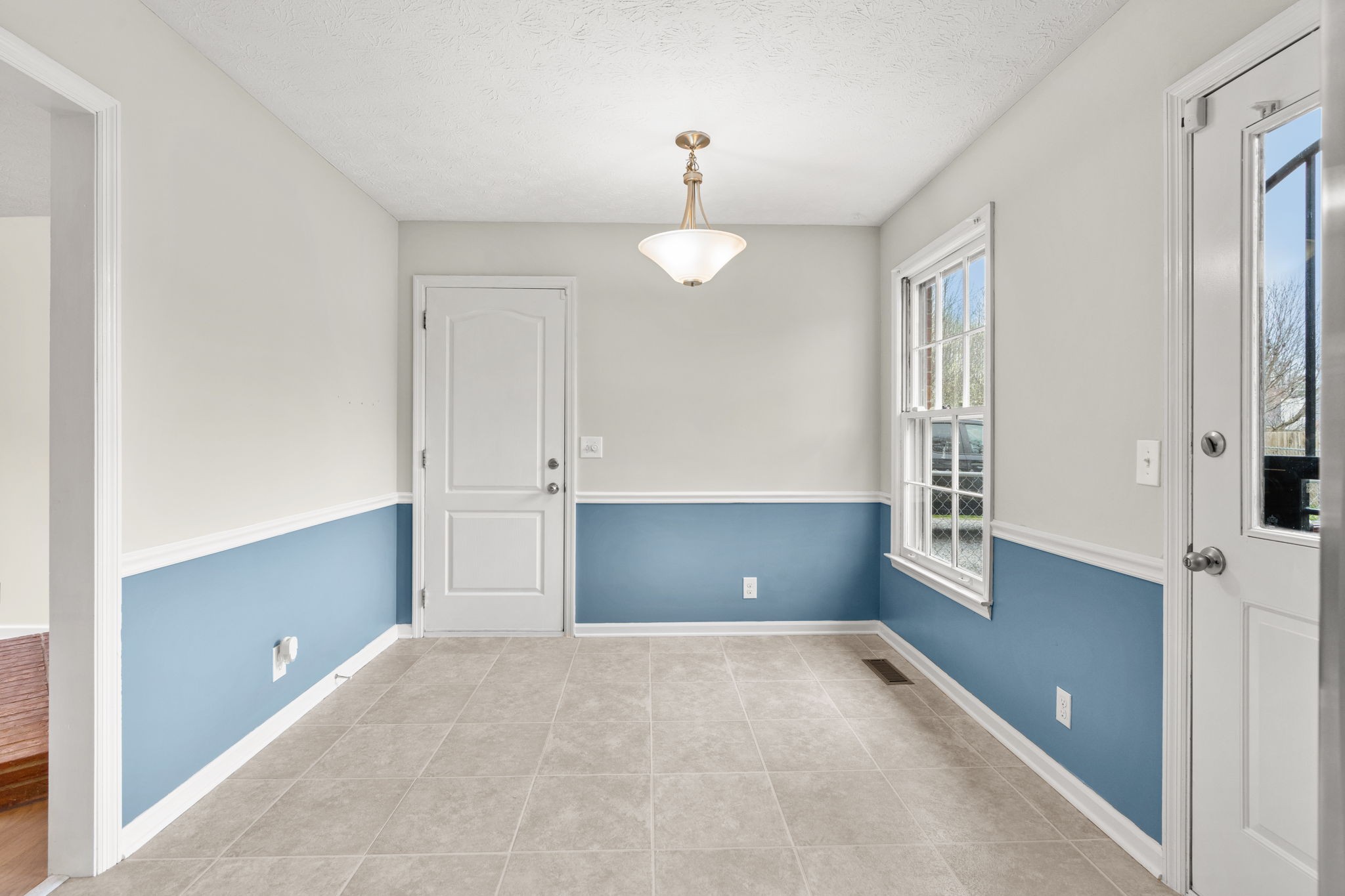 108 Meadows Road White House, TN 37188 - Photo 10 of 27 wooden floor in an empty room with a window