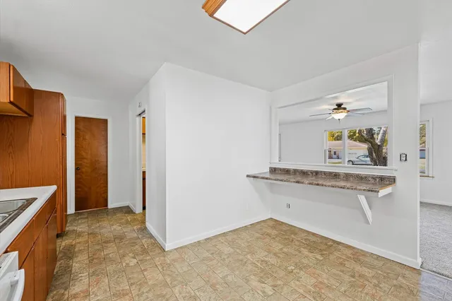 a view of a kitchen with a sink