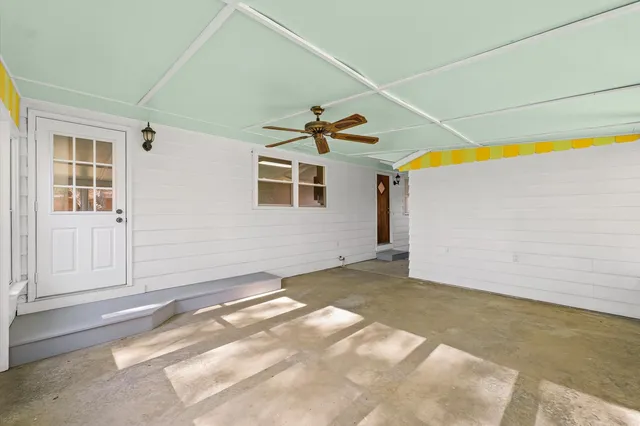 an empty room with windows