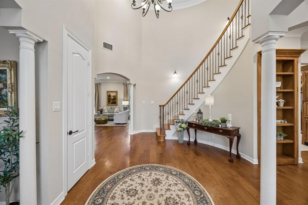 2930 Falcon Way Midlothian, TX 76065 - Photo 2 of 40 a view of entryway and hall with wooden floor