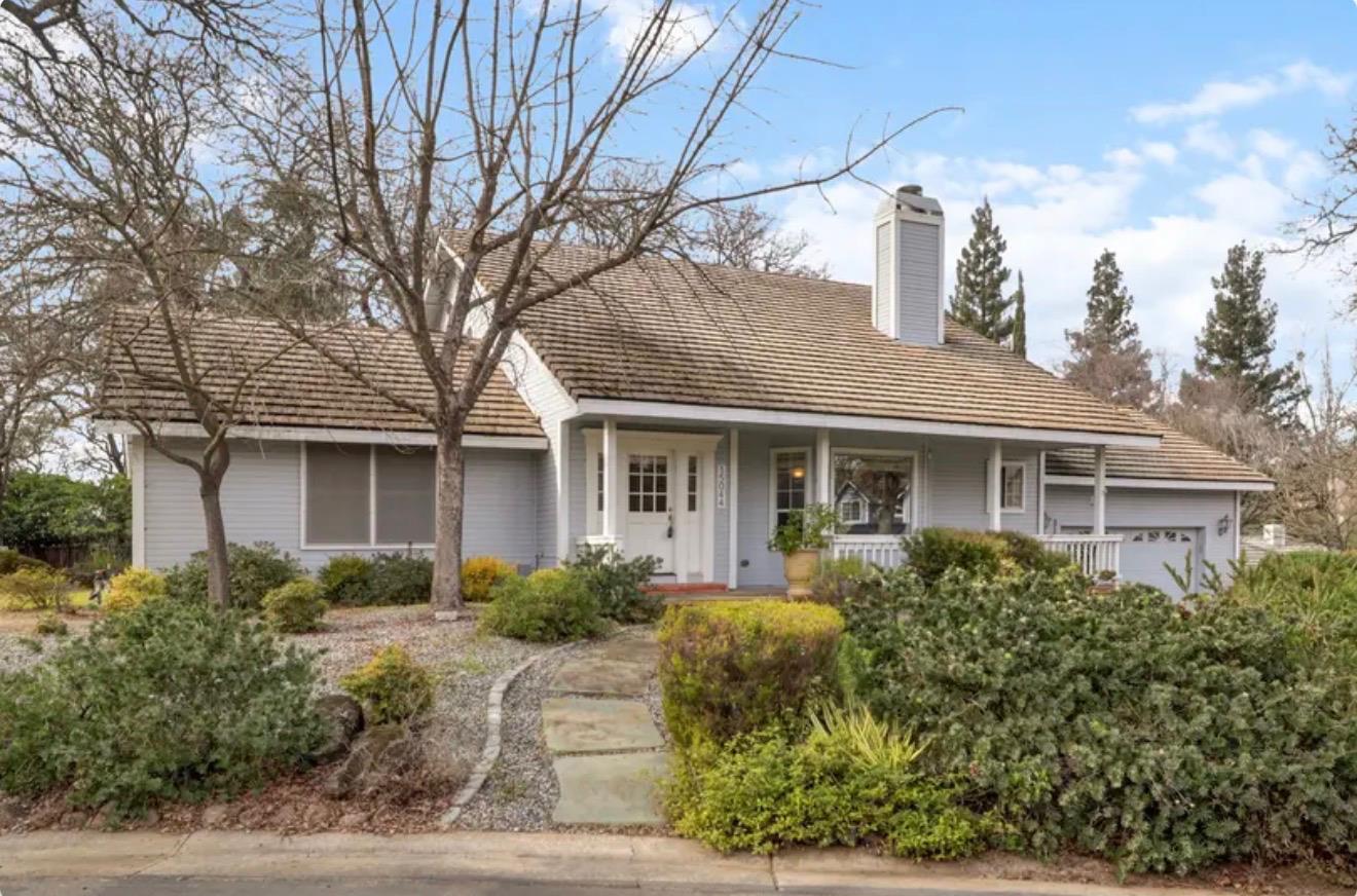 15044 Rio Circle Rancho Murieta, CA 95683 - Photo 2 of 50 a front view of a house with garden