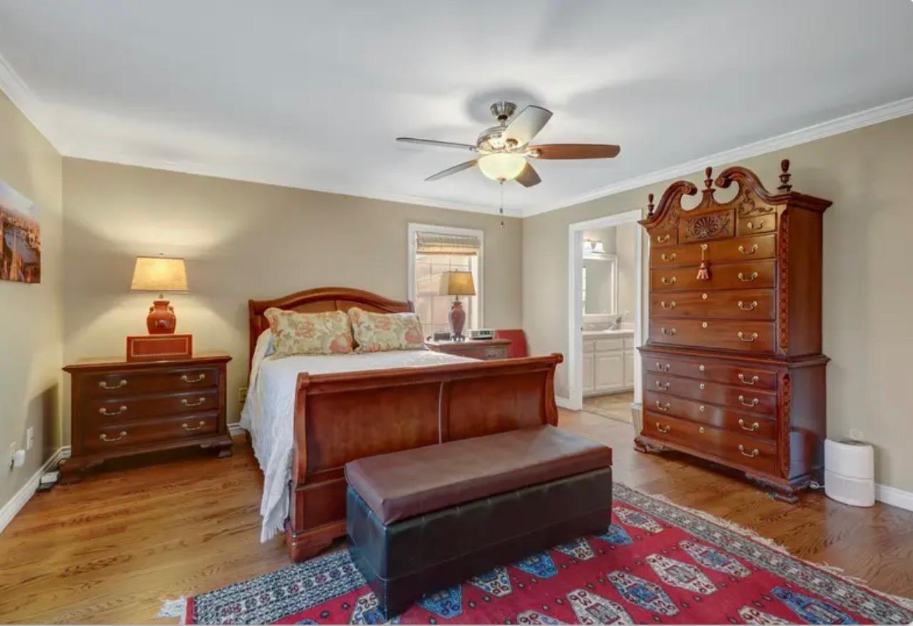 15044 Rio Circle Rancho Murieta, CA 95683 - Photo 23 of 50 a bedroom with a bed window and a dresser