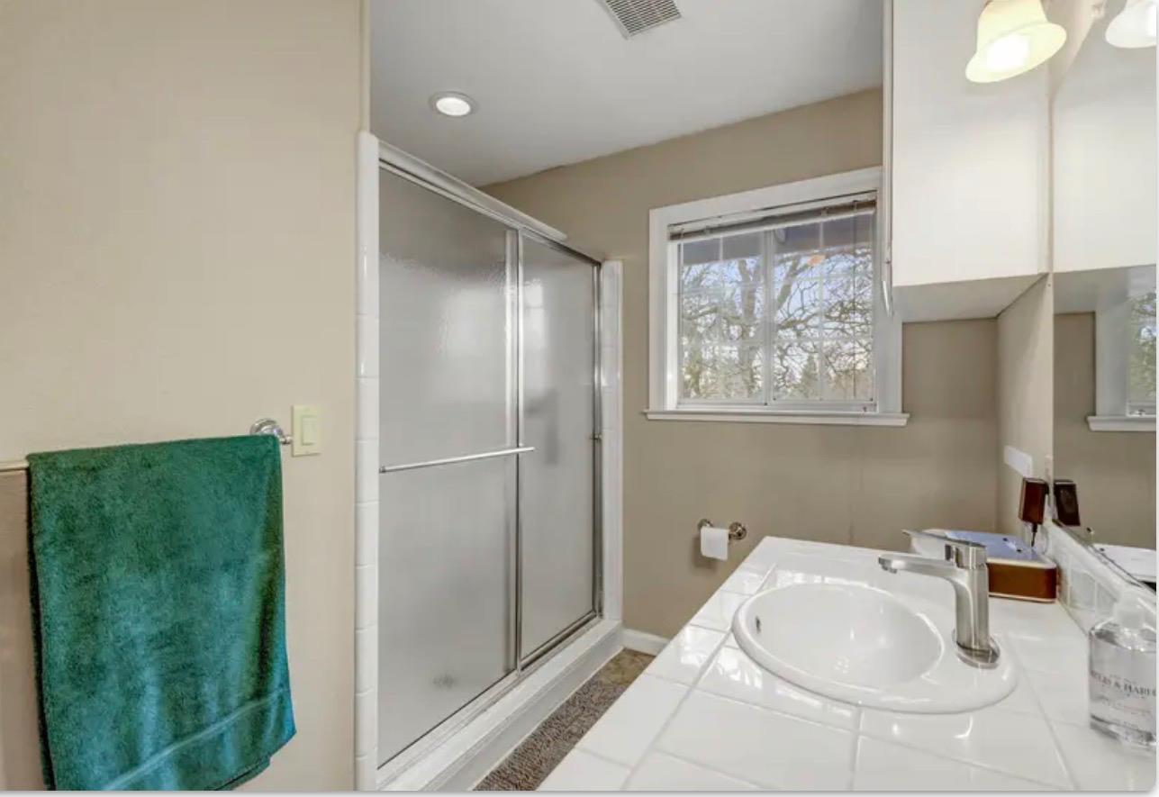 15044 Rio Circle Rancho Murieta, CA 95683 - Photo 35 of 50 a bathroom with a sink and a mirror