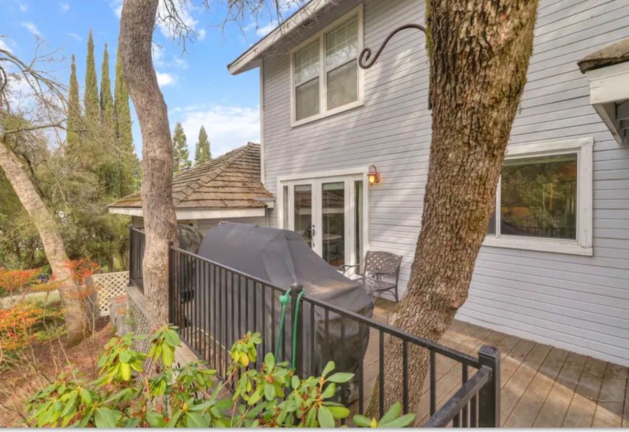 15044 Rio Circle Rancho Murieta, CA 95683 - Photo 43 of 50 a view of a house with wooden fence