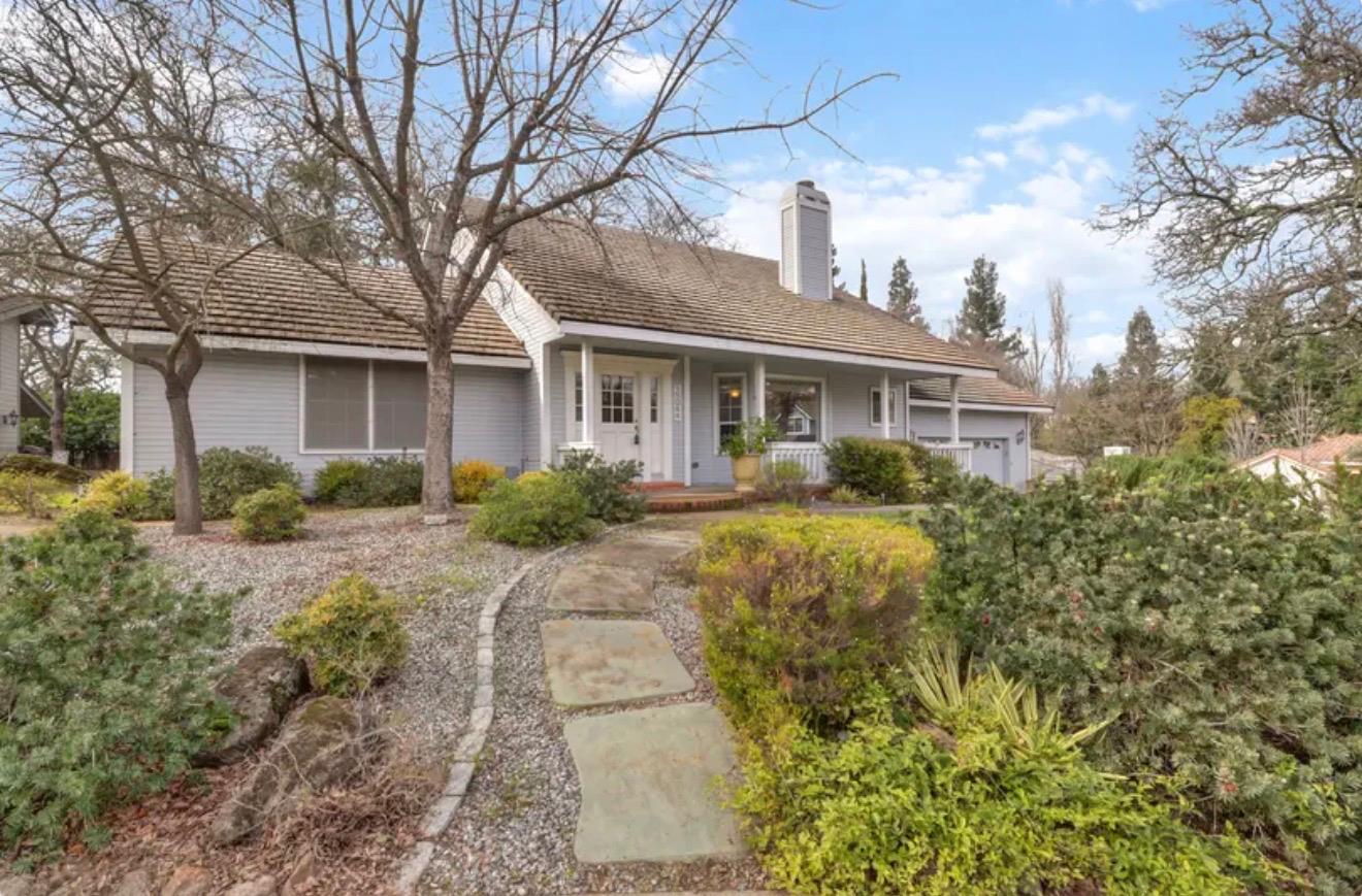 15044 Rio Circle Rancho Murieta, CA 95683 - Photo 49 of 50 a front view of house with yard and trees around