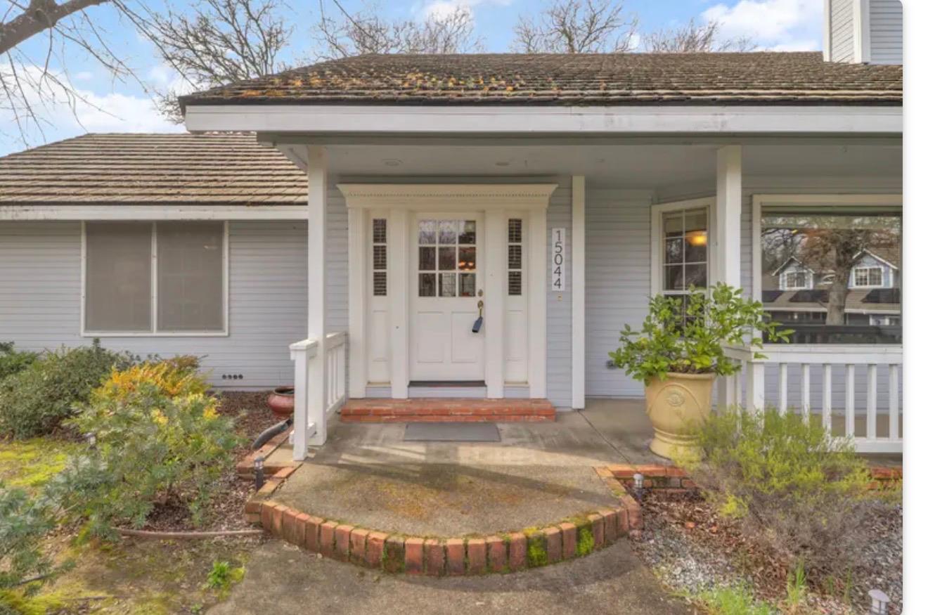 15044 Rio Circle Rancho Murieta, CA 95683 - Photo 5 of 50 a view of a house with potted plants