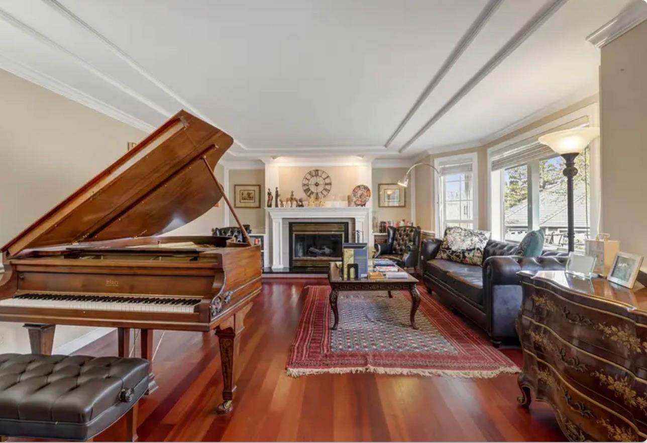 15044 Rio Circle Rancho Murieta, CA 95683 - Photo 6 of 50 a living room with furniture a fireplace and a table