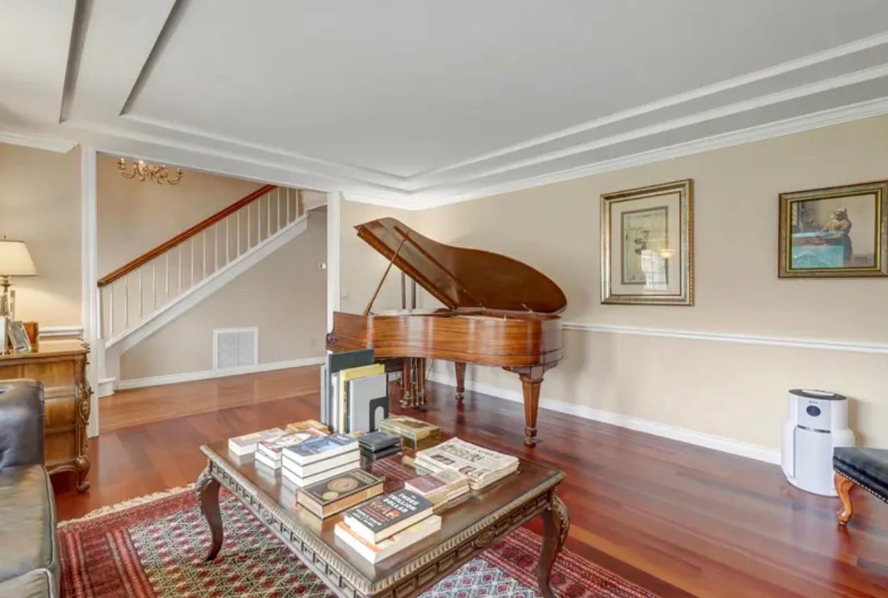 15044 Rio Circle Rancho Murieta, CA 95683 - Photo 10 of 50 a living room with furniture and a wooden floor