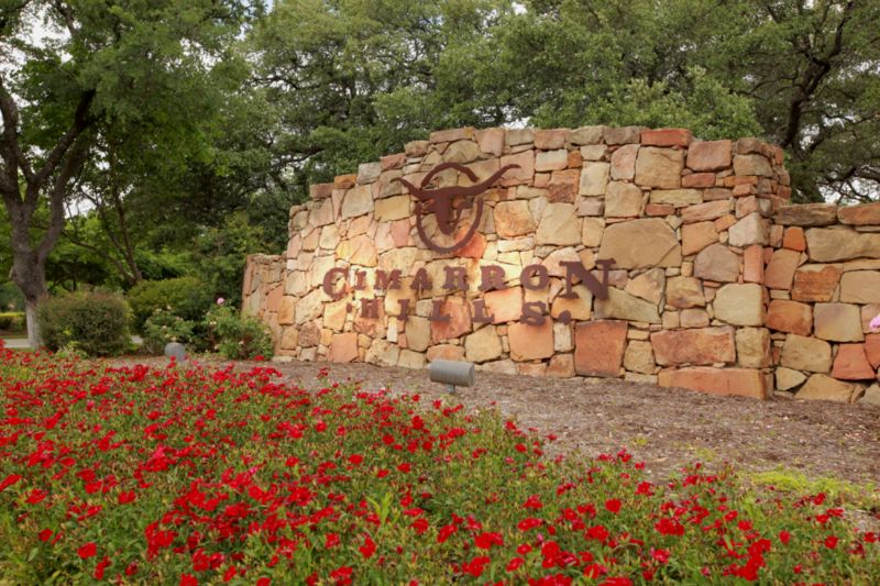 100 Sunny Bell Court Georgetown, TX 78628 - Photo 11 of 16 a wooden building with trees in front of it