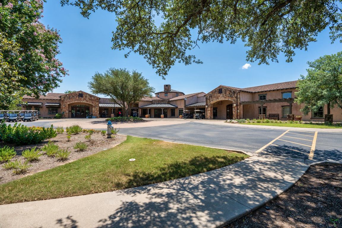 100 Sunny Bell Court Georgetown, TX 78628 - Photo 13 of 16 a front view of a house with a yard