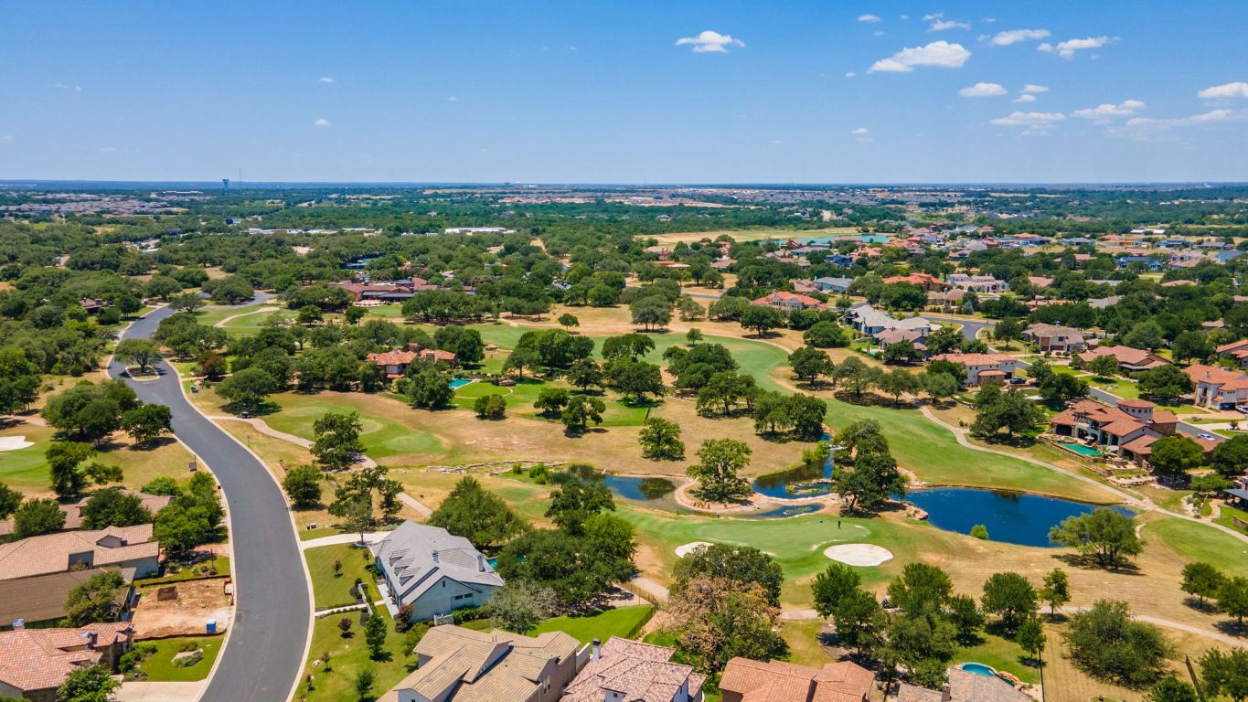 100 Sunny Bell Court Georgetown, TX 78628 - Photo 6 of 16 an aerial view of residential houses with outdoor space