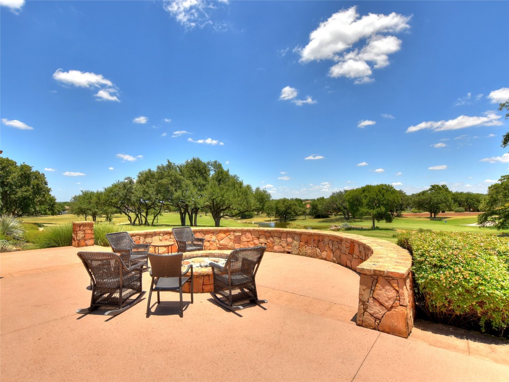 100 Sunny Bell Court Georgetown, TX 78628 - Photo 8 of 16 a view of a swimming pool and lounge chair