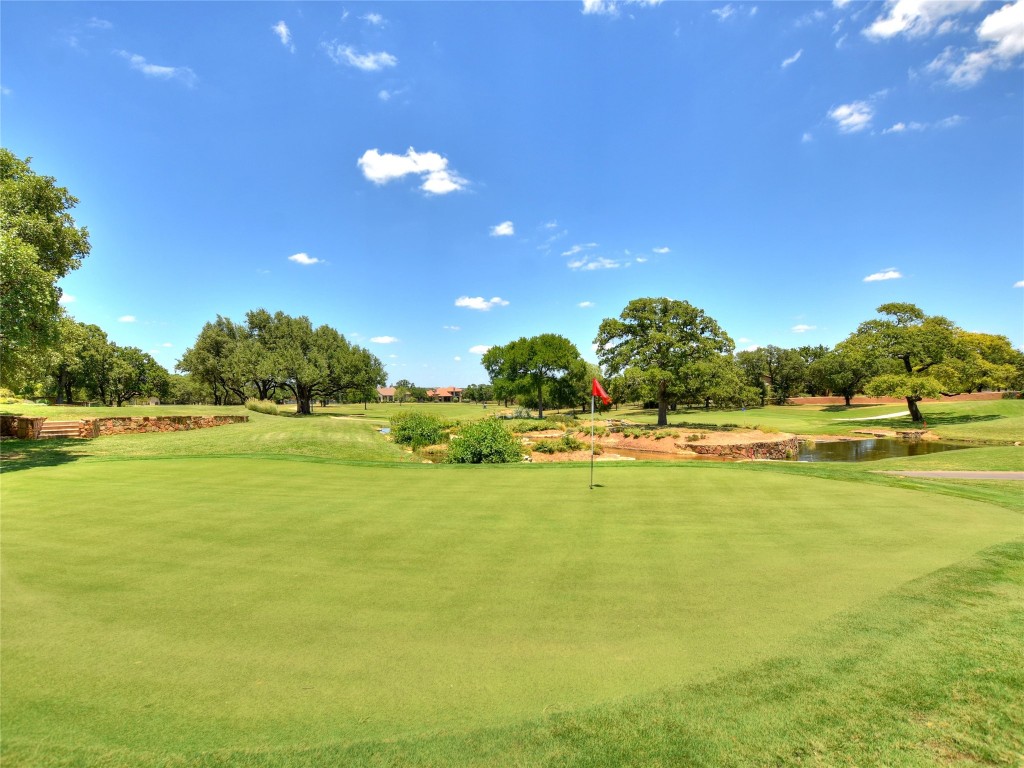 100 Sunny Bell Court Georgetown, TX 78628 - Photo 9 of 16 a view of an ocean and a yard