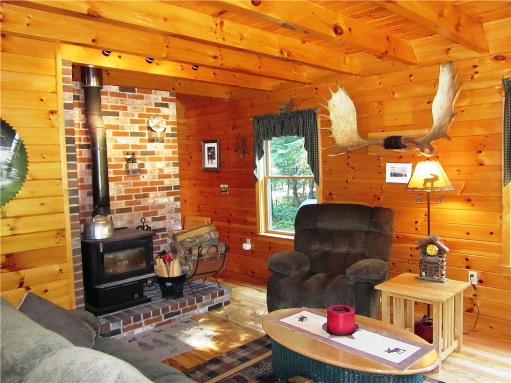83 Eustis Ridge Road Eustis, ME 04936 - Photo 1 of 31 Warm & Inviting Living Room - Main Home