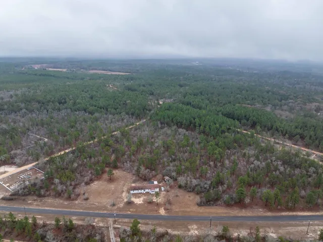a view of a city street from a yard
