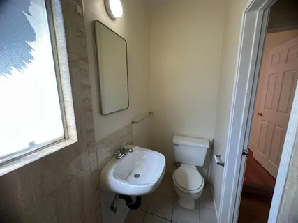a bathroom with a shower and a tub