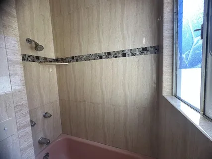 a kitchen with a stove and a sink