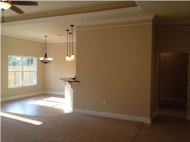 4619 Hermosa Road Crestview, FL 32539 - Photo 11 of 25 a view of a room with a chandelier