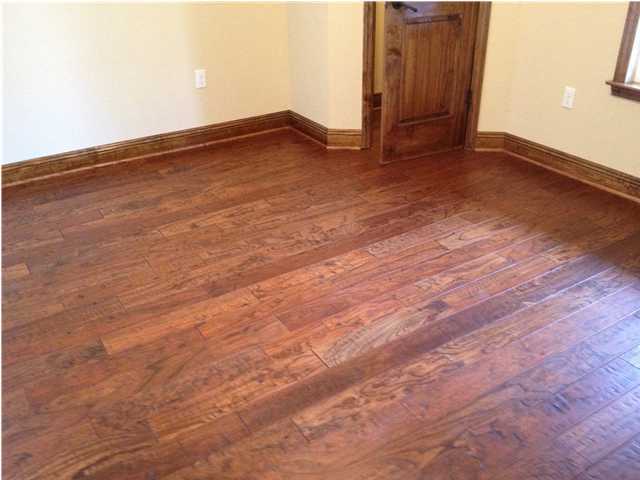 4619 Hermosa Road Crestview, FL 32539 - Photo 15 of 25 an empty room with wooden floor