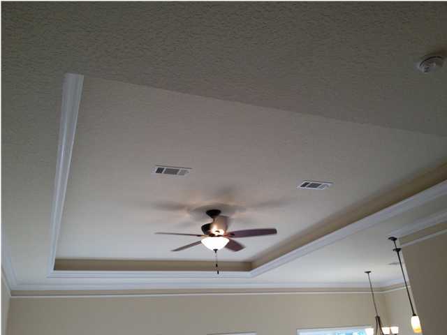 4619 Hermosa Road Crestview, FL 32539 - Photo 3 of 25 a view of a living room with a ceiling fan