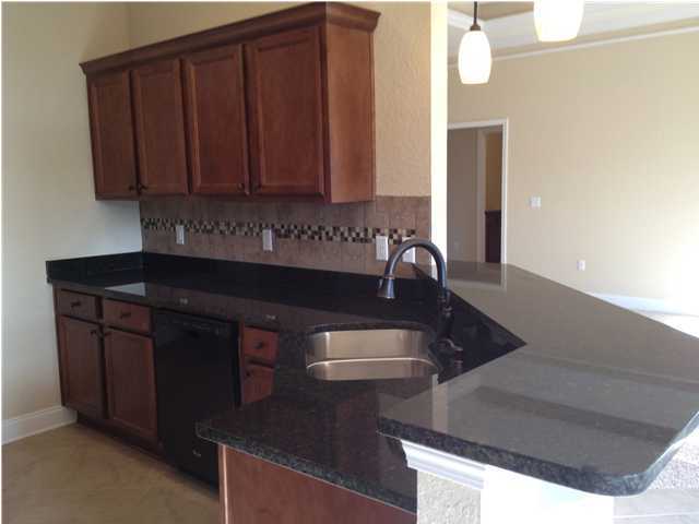 4619 Hermosa Road Crestview, FL 32539 - Photo 22 of 25 a kitchen with sink and cabinets