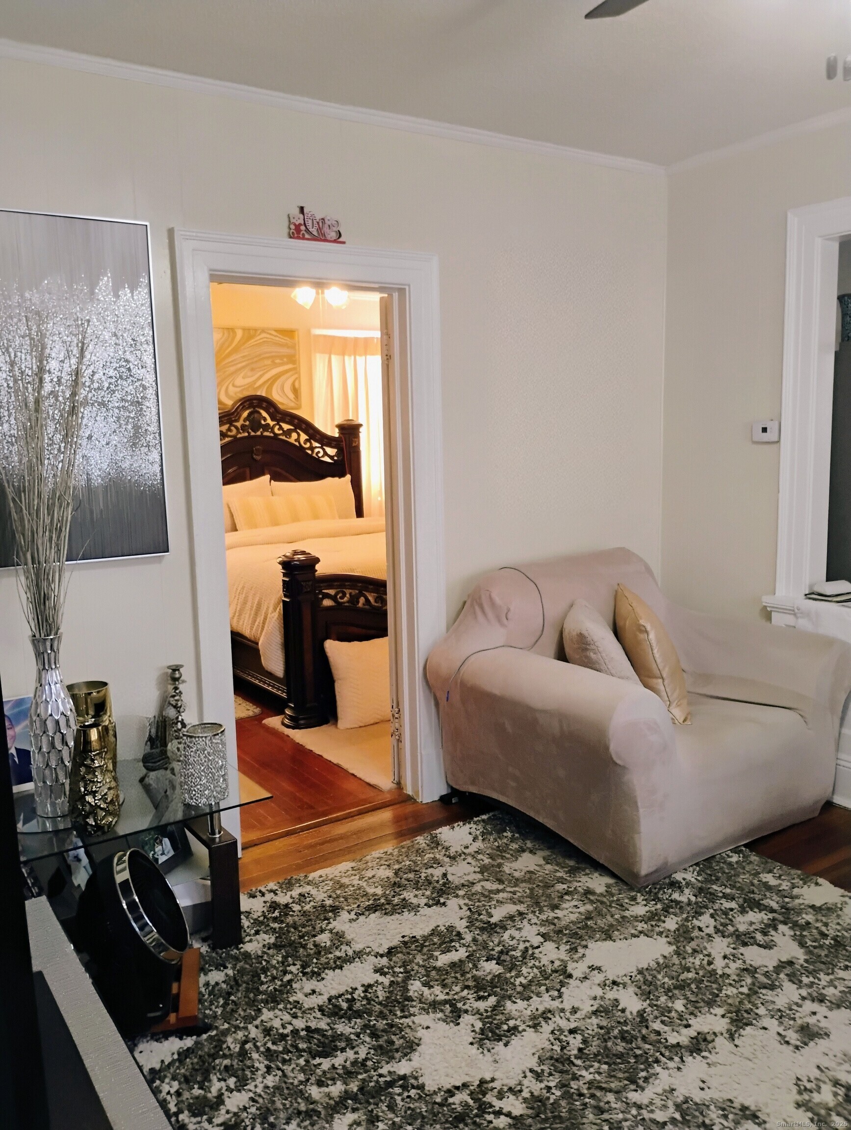 83 Colebrook Street Hartford, CT 06112 - Photo 27 of 36 a living room with furniture and a large window