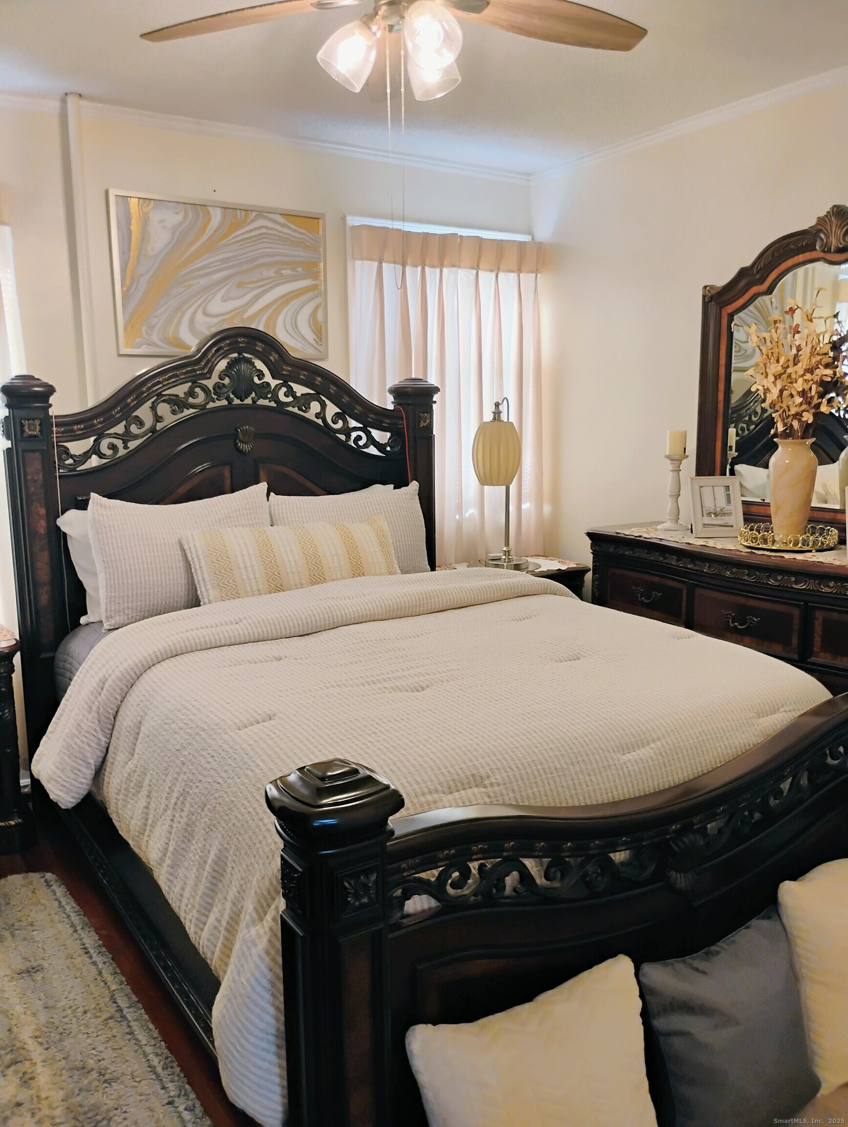 83 Colebrook Street Hartford, CT 06112 - Photo 31 of 36 a bedroom with a bed and window