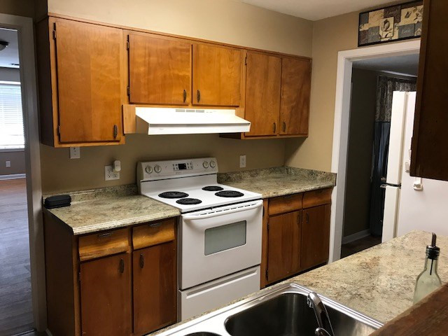 2269 Overlook Road Augusta, GA 30906 - Photo 6 of 23 STOVE WALL OF KITCHEN, LOTS OF CABINETS