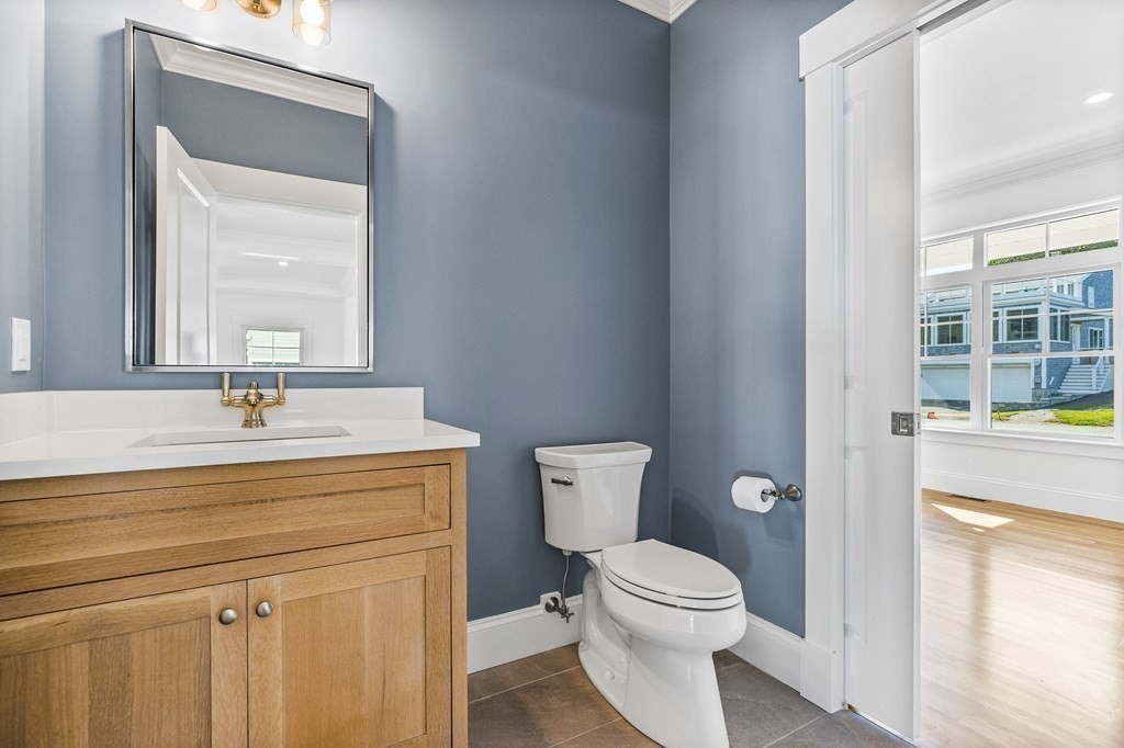 40 Foley Beach Road Hingham, MA 02043 - Photo 12 of 37 a bathroom with a sink a toilet and shower