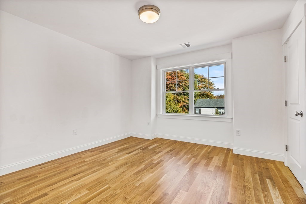 40 Foley Beach Road Hingham, MA 02043 - Photo 20 of 37 an empty room with a window