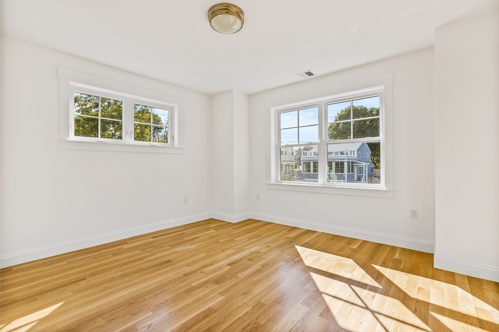 40 Foley Beach Road Hingham, MA 02043 - Photo 21 of 37 a bedroom with a bed and a window