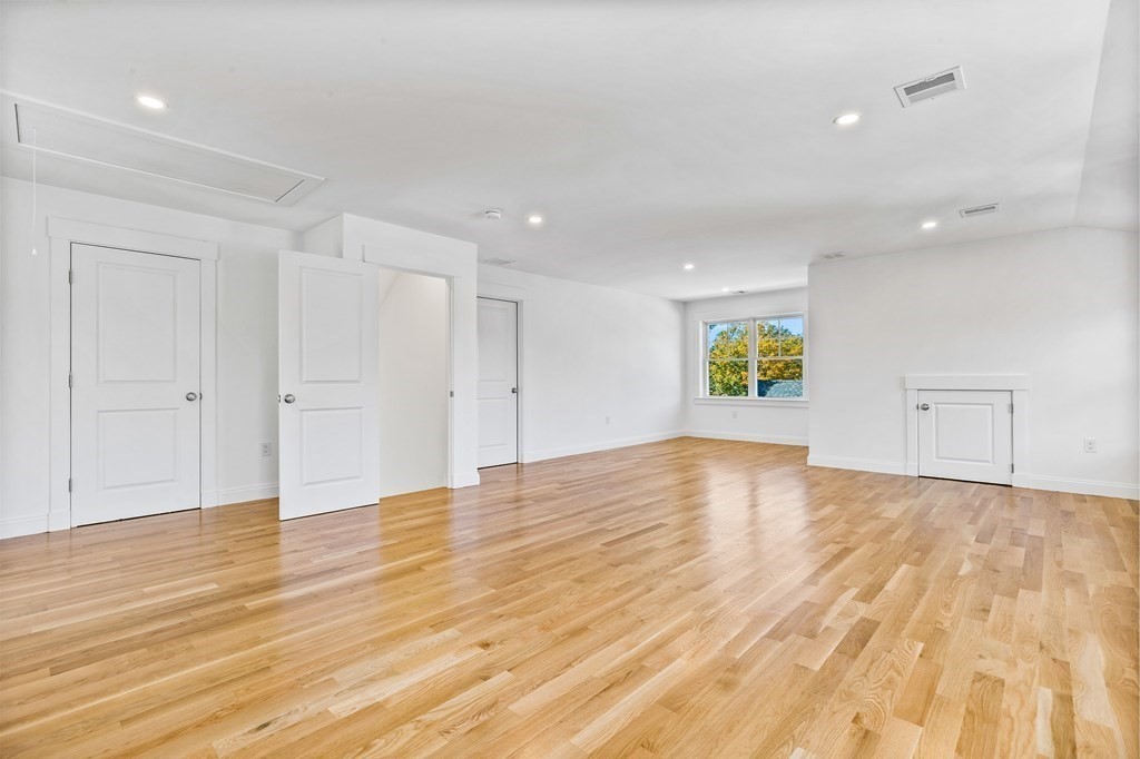 40 Foley Beach Road Hingham, MA 02043 - Photo 29 of 37 a view of empty room with wooden floor and window