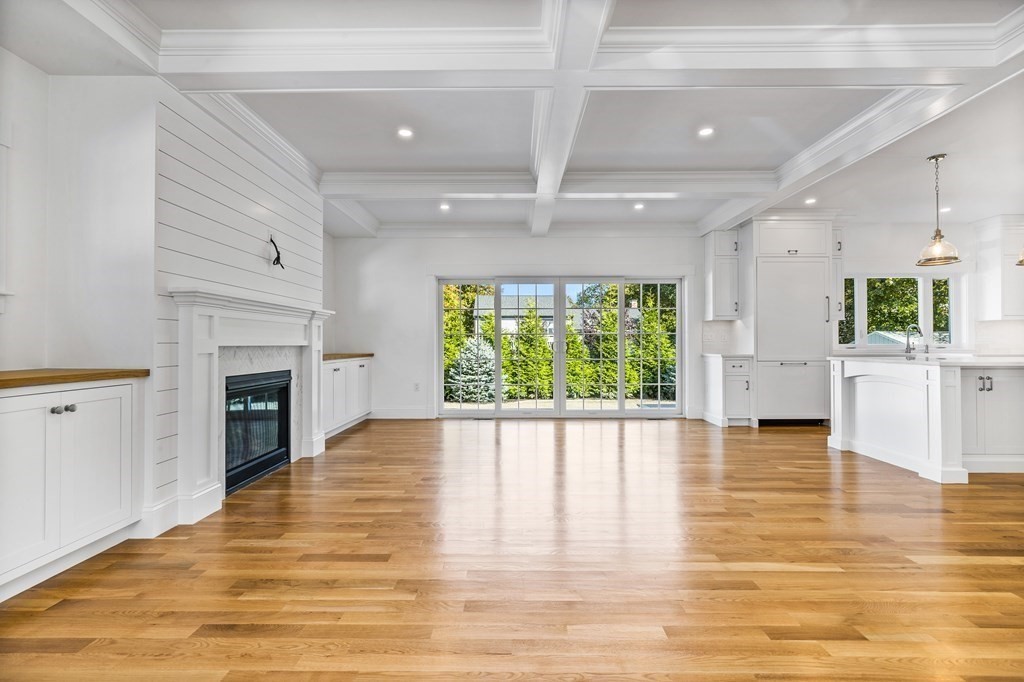 40 Foley Beach Road Hingham, MA 02043 - Photo 3 of 37 a view of a livingroom with a fireplace window and wooden floor