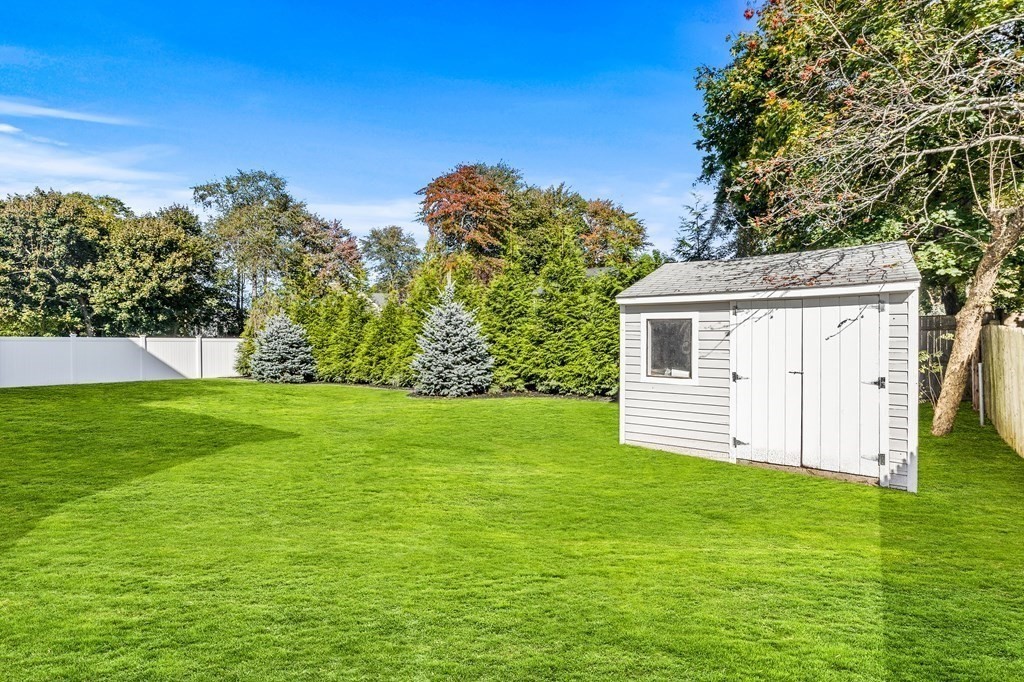 40 Foley Beach Road Hingham, MA 02043 - Photo 35 of 37 a view of a house with a yard