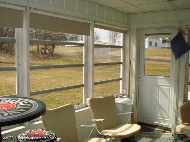 12 Grassy Pond Road Hunlock Creek, PA 18621 - Photo 9 of 9 a view of a dining room with furniture window and wooden floor