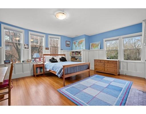 85 Griggs Road Brookline, MA 02446 - Photo 11 of 28 a bedroom with furniture and a large window