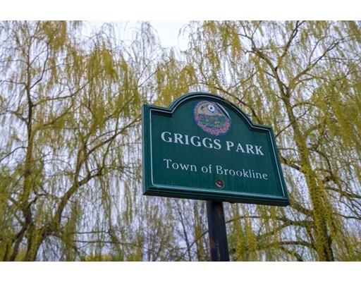 85 Griggs Road Brookline, MA 02446 - Photo 21 of 28 a sign broad on wooden wall