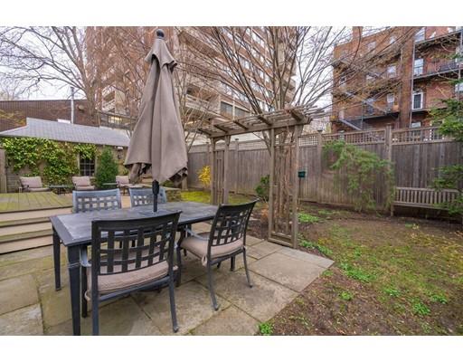 85 Griggs Road Brookline, MA 02446 - Photo 25 of 28 a view of a dinning tables and chairs in the patio