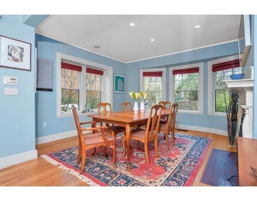 85 Griggs Road Brookline, MA 02446 - Photo 6 of 28 a view of a dining room with furniture window and wooden floor