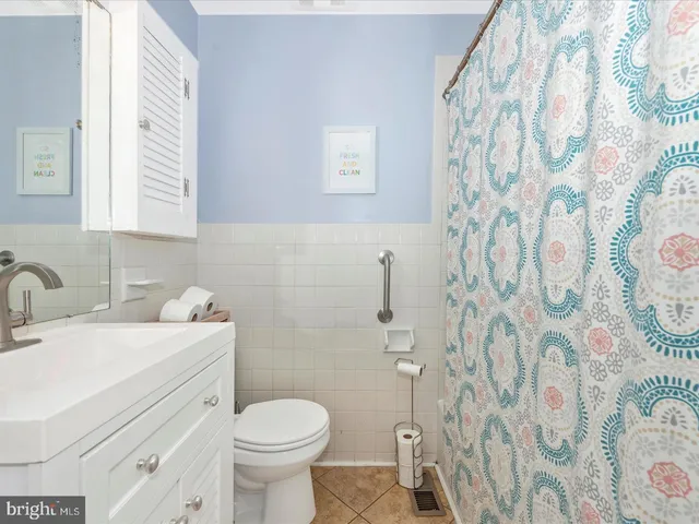 a bedroom with furniture and a bed