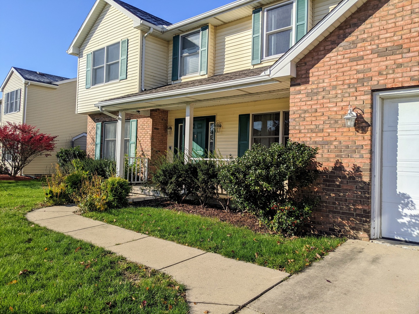 1409 Cobblefield Road Champaign, IL 61822 - Photo 2 of 73 a front view of a house with garden