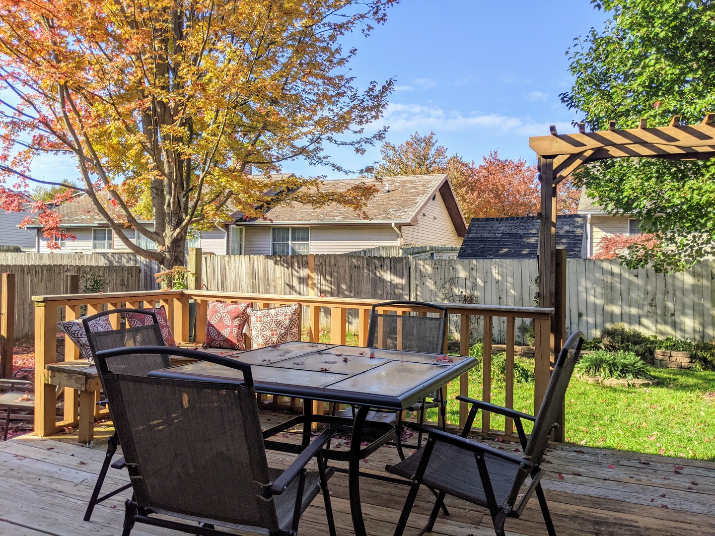 1409 Cobblefield Road Champaign, IL 61822 - Photo 17 of 73 a view of balcony with table and chairs