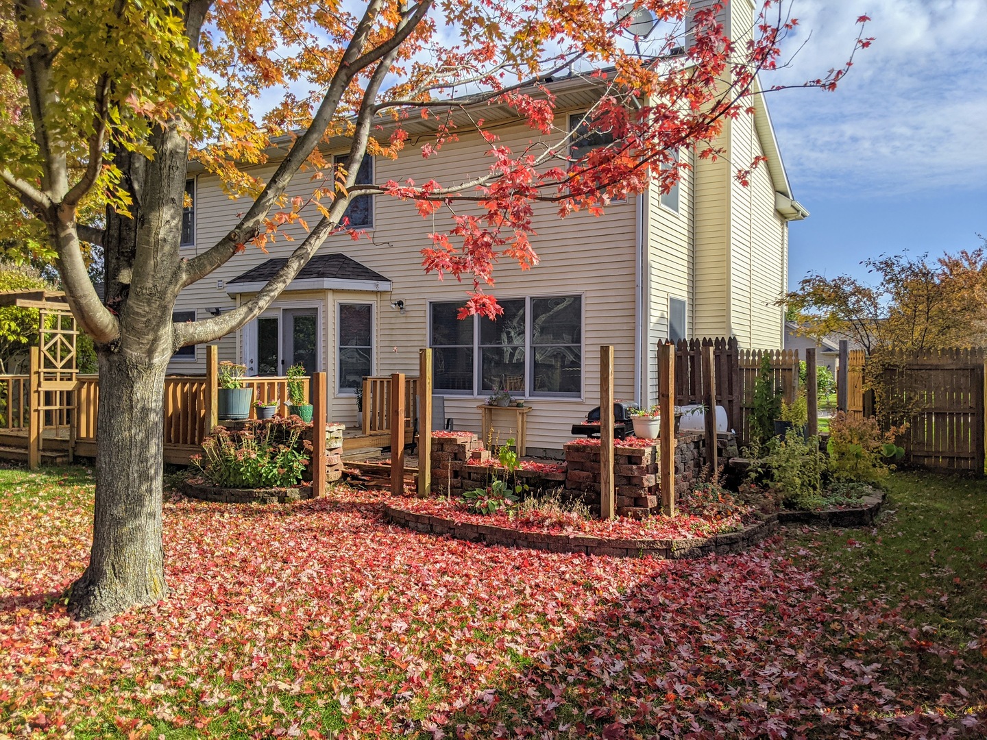 1409 Cobblefield Road Champaign, IL 61822 - Photo 22 of 73 a view of a house with backyard porch and sitting area