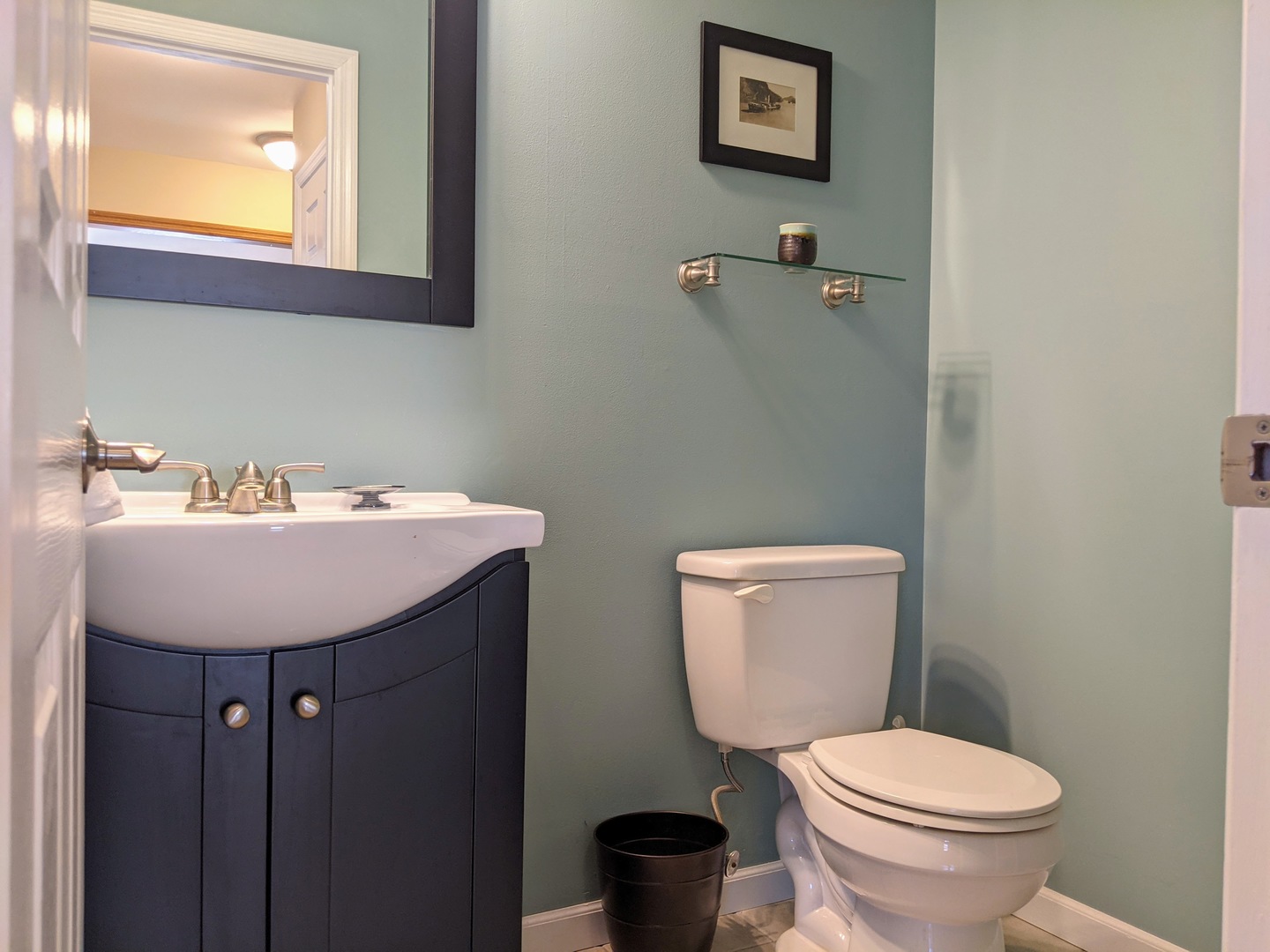 1409 Cobblefield Road Champaign, IL 61822 - Photo 32 of 73 a bathroom with a toilet a sink and mirror