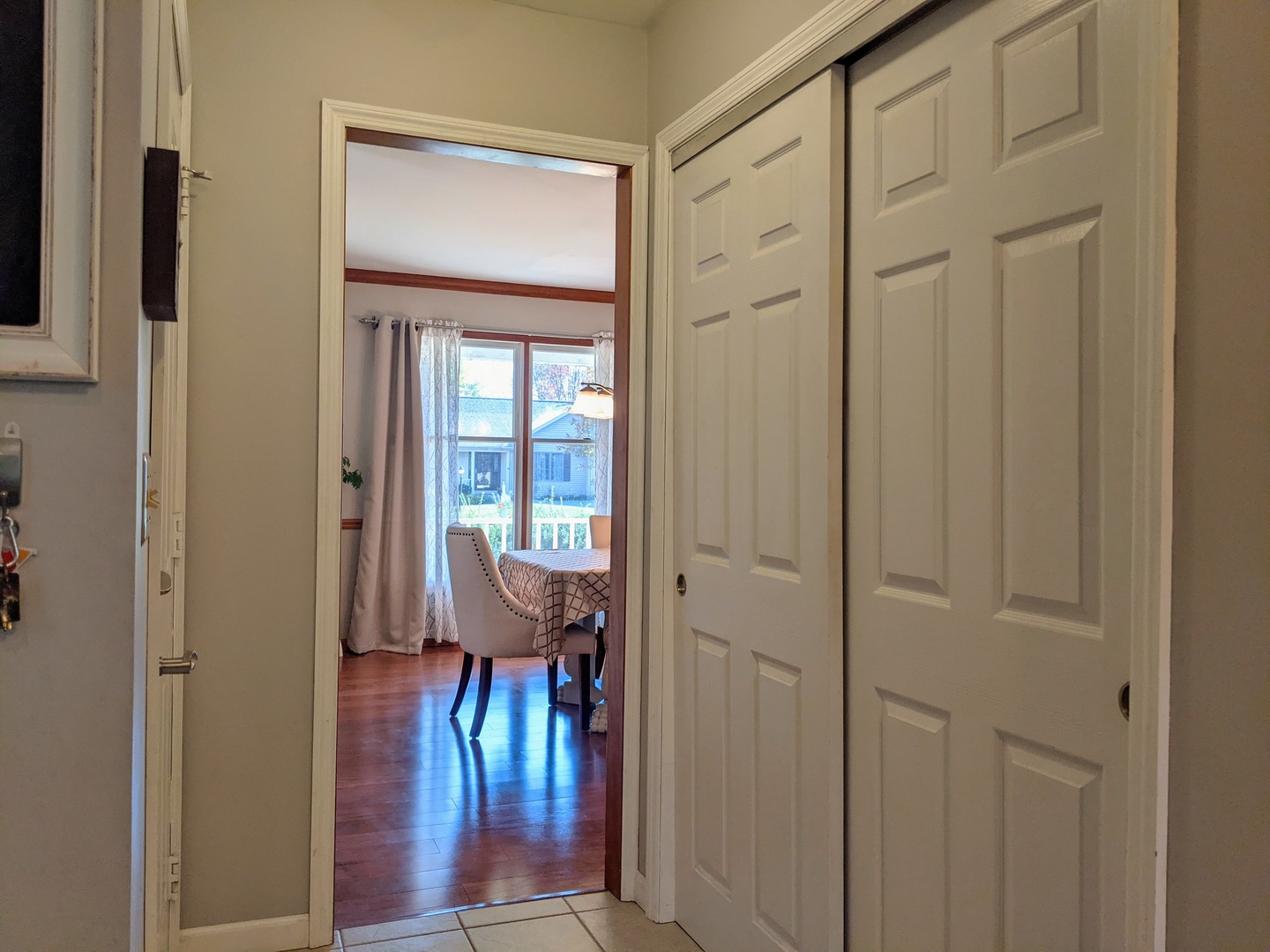 1409 Cobblefield Road Champaign, IL 61822 - Photo 34 of 73 a view of a hallway with dining room and hallway with wooden floor