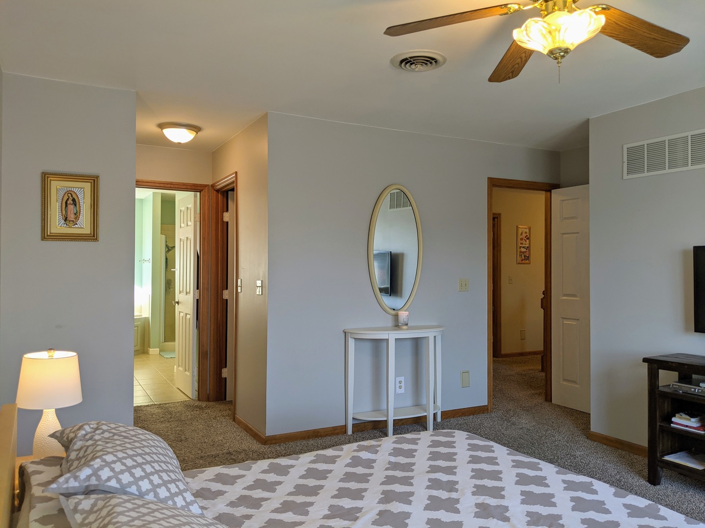 1409 Cobblefield Road Champaign, IL 61822 - Photo 40 of 73 a bedroom with a bed and a lamp on table