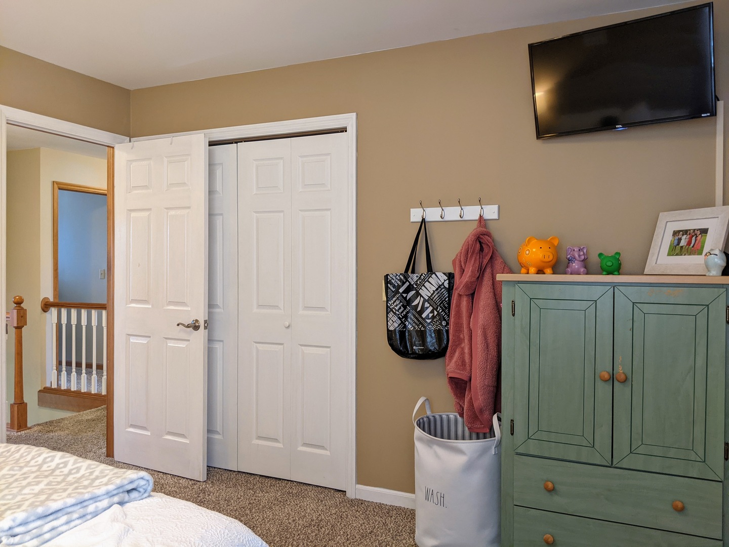 1409 Cobblefield Road Champaign, IL 61822 - Photo 51 of 73 a living room with furniture and a flat screen tv