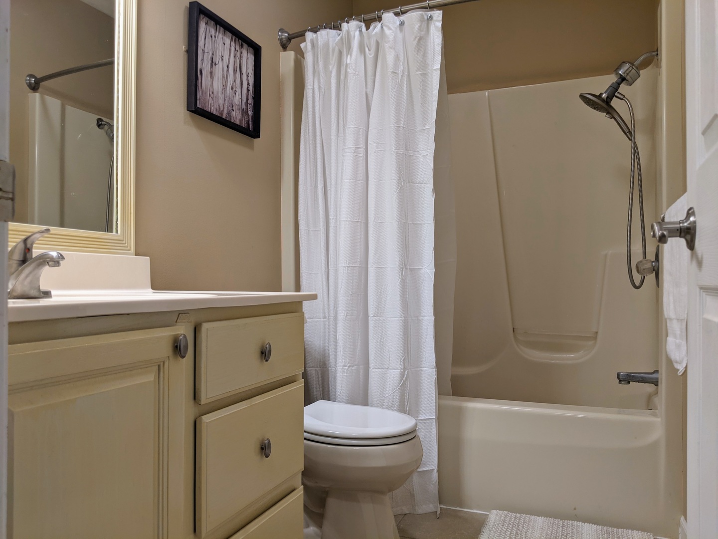 1409 Cobblefield Road Champaign, IL 61822 - Photo 52 of 73 a bathroom with a sink a toilet and shower